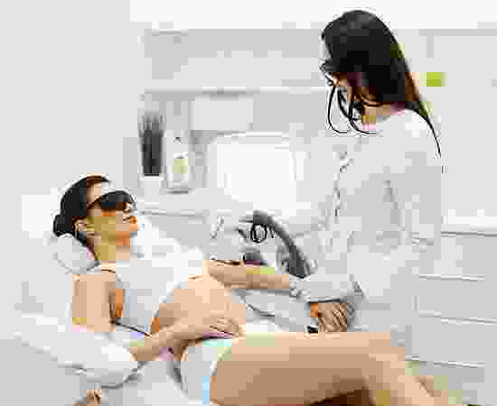 blog-detail-6 A woman getting her teeth checked by an esthetician.